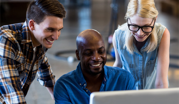 three people using Architronics computer